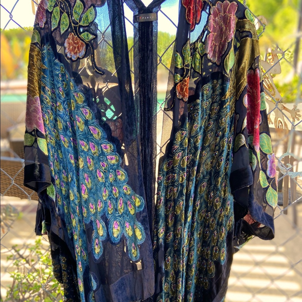 Beautiful long embellished vest. One size fits all. New. $50